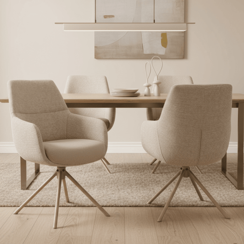 Two beige armchairs with wooden legs on a white background