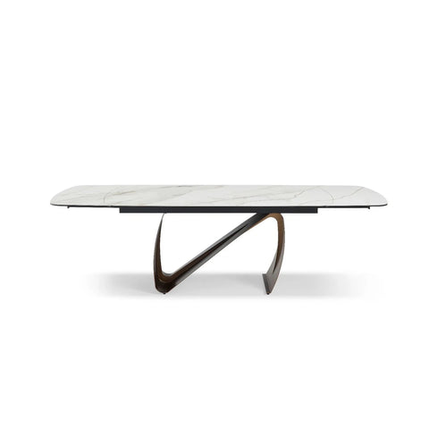 Shop the Alfonso extending dining table with Sunset Statuario stone top and brushed brass N base. Luxury table extending from 180cm to 260cm.