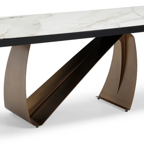 Base Close up of Luxury dining table with brushed brass N shaped base