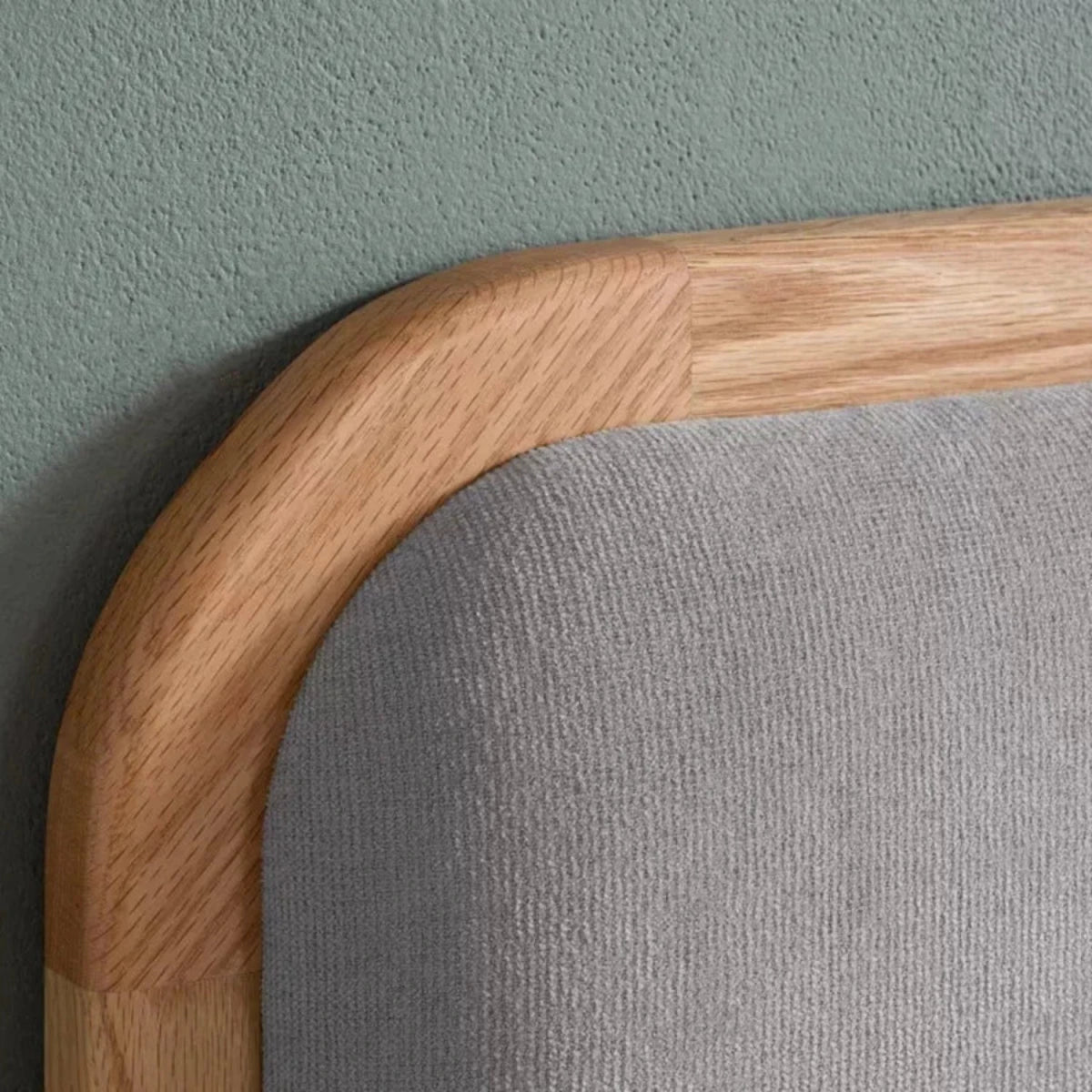 Soft padded linen panels adding comfort and subtle texture.