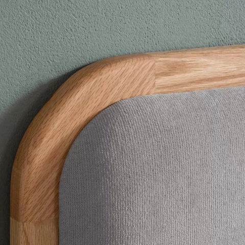 Soft padded linen panels adding comfort and subtle texture.