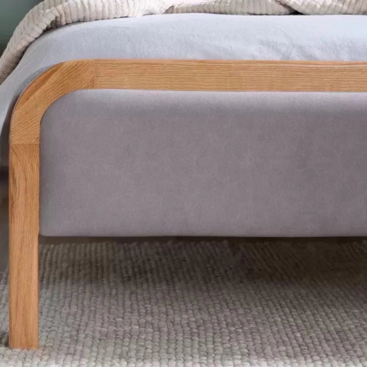 Solid wooden bed legs with natural finish and strong support.