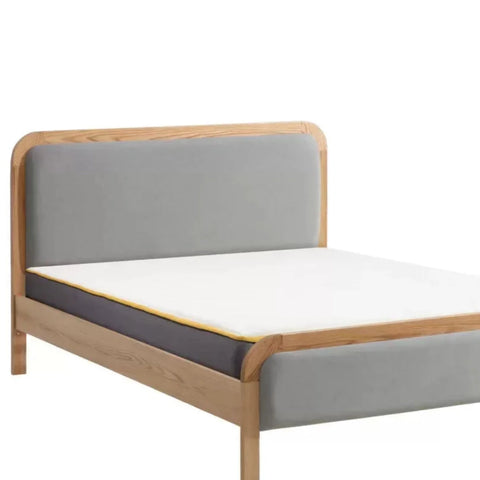 Soft padded linen panels adding comfort and subtle texture.