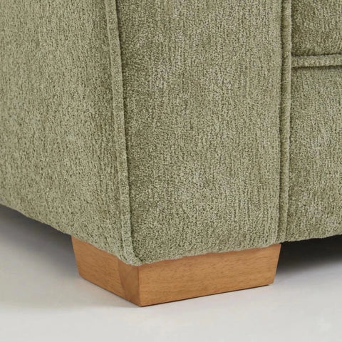 Wooden sofa legs detail showing sturdy build and elegant finish.