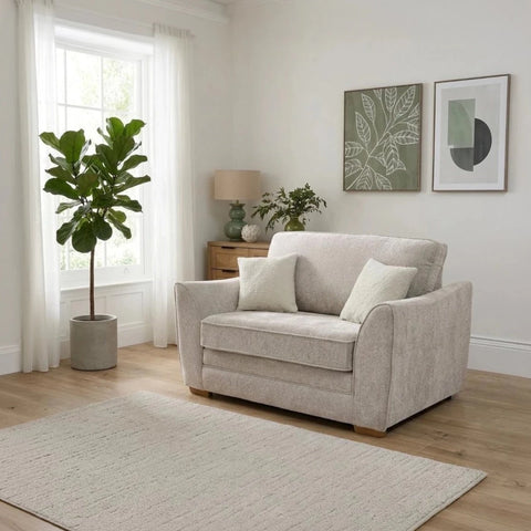 Andover Leo love chair with compact design and curved arms.