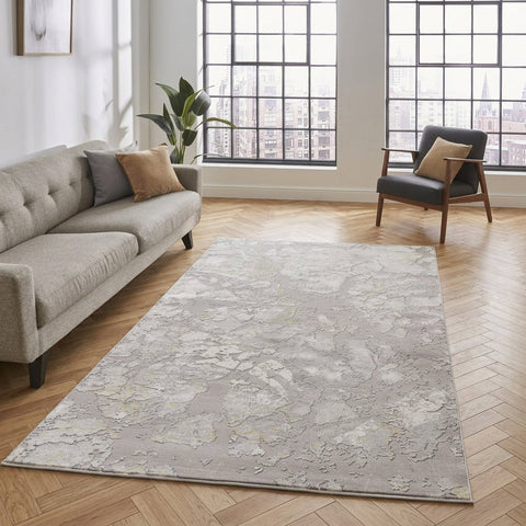 Apollo 2677 Modern Abstract Rug in Grey/Gold styled in a modern bedroom
