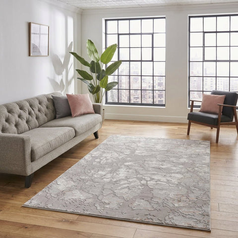 Apollo 2677 Modern Abstract Rug in Grey/Rose styled in a modern bedroom