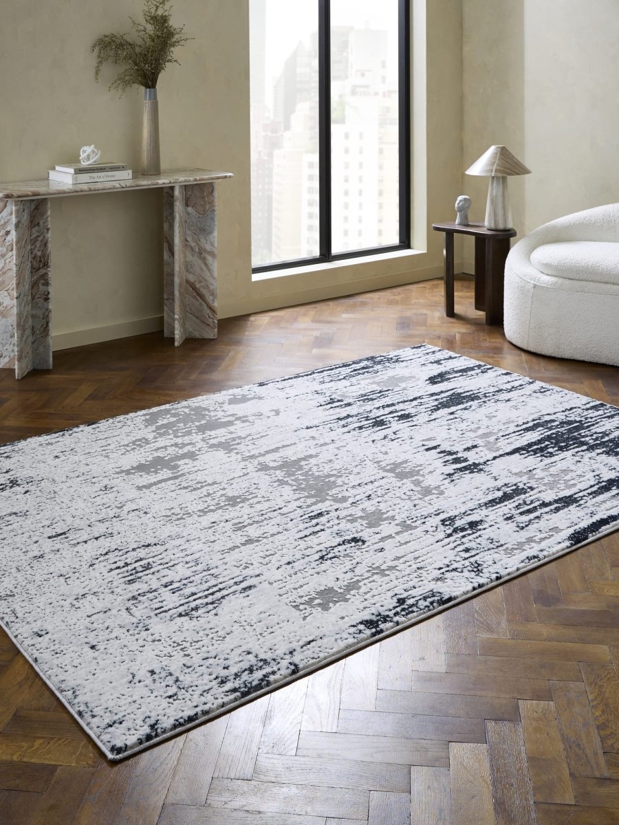 Apollo CK406 Modern Abstract Rug in Grey/Green styled in a modern room