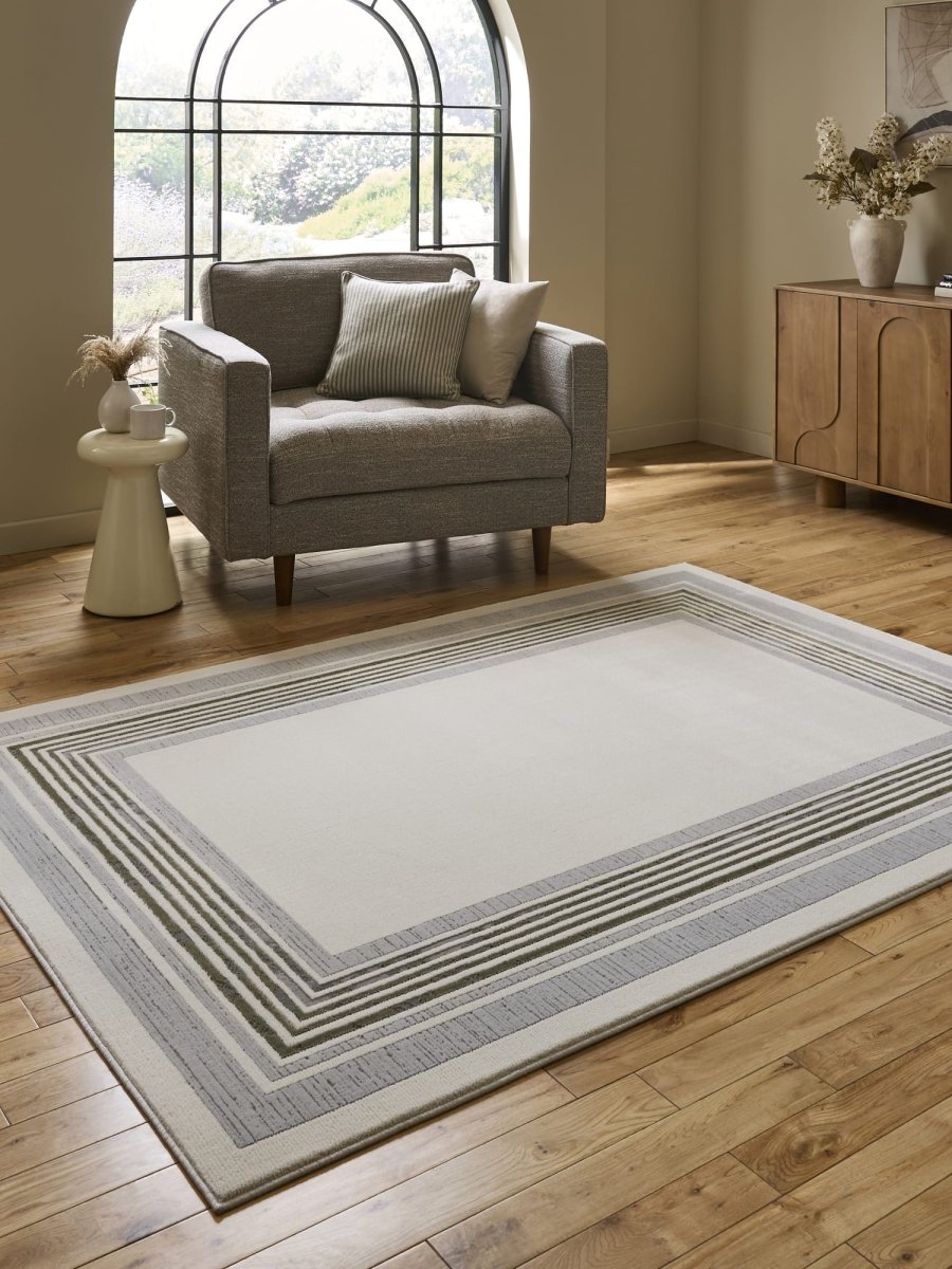 Apollo CK417 Modern Geometric Rug in Ivory/Green styled in a modern room