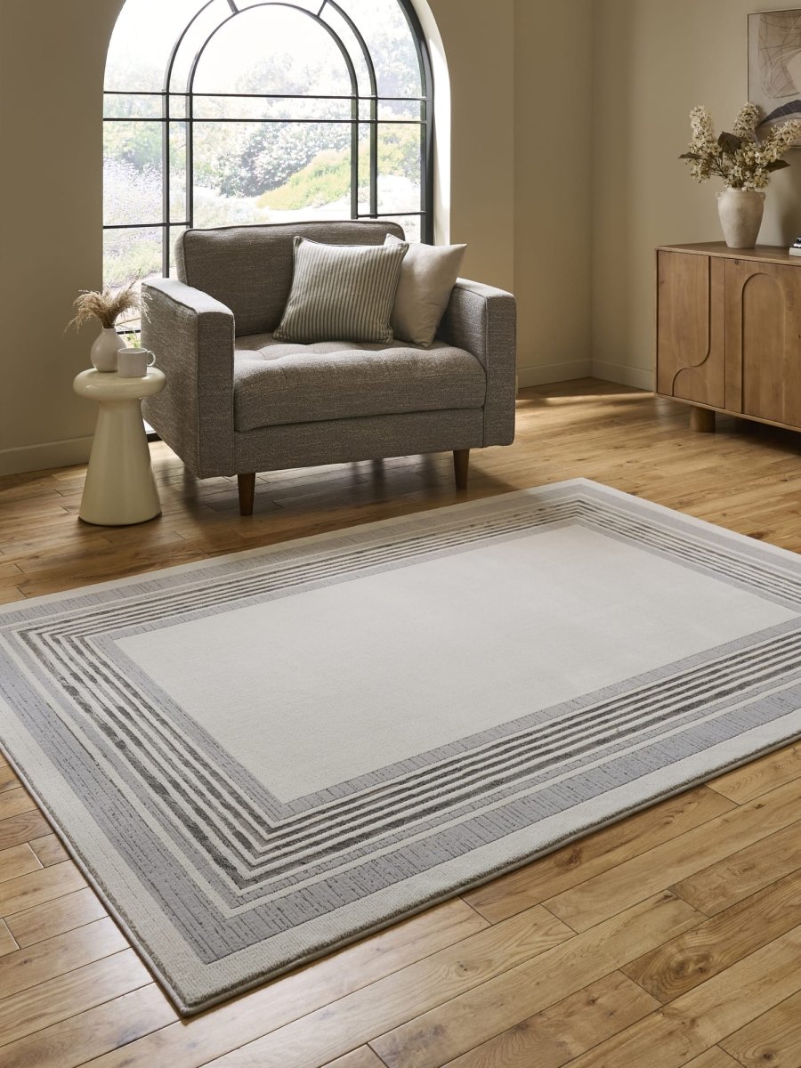 Apollo CK417 Modern Geometric Rug in Ivory/Green styled in a modern room