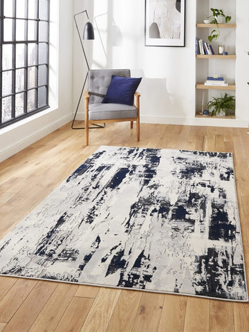 Apollo CR579 Modern Abstract Rug in Grey/Navy styled in a modern room