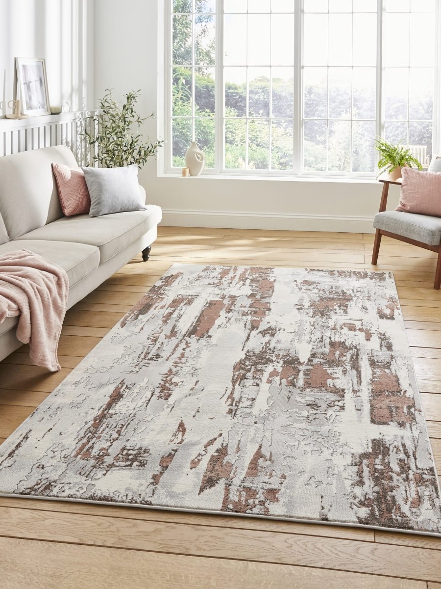 Apollo CR579 Modern Abstract Rug in Grey/Rose styled in a modern room