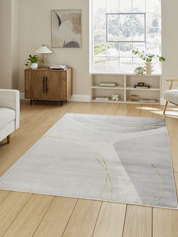 Apollo E9974 Modern Abstract Rug in Grey/Gold styled in a modern room