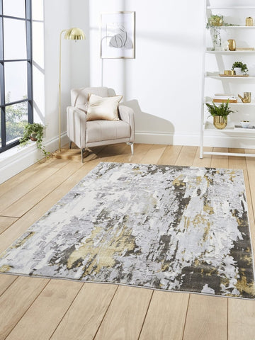 Apollo GR580  Modern Abstract Rug in Grey/Gold styled in a modern room