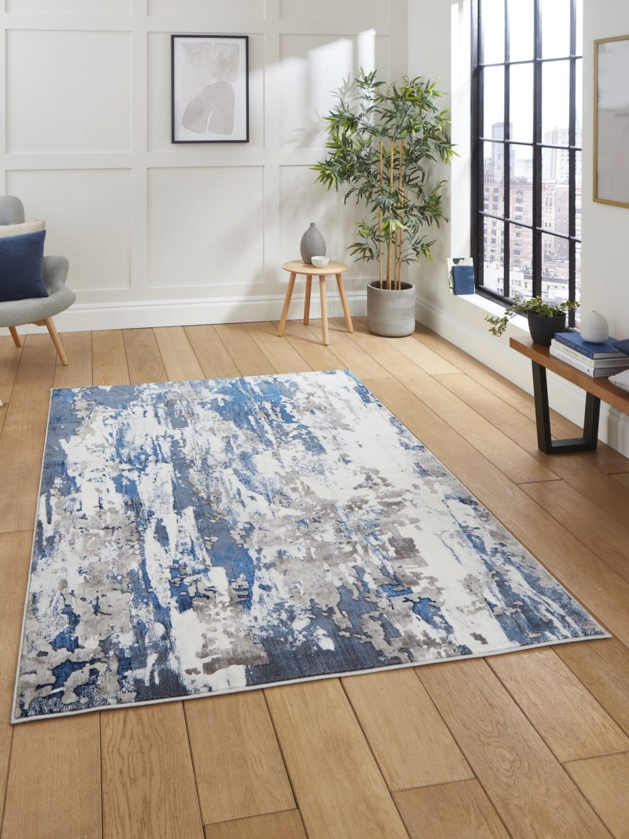 Apollo GR580  Modern Abstract Rug in grey Navy styled in a modern room