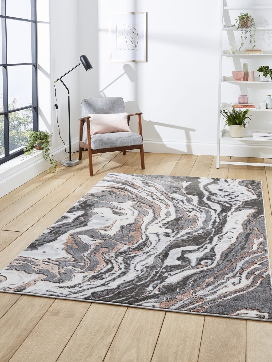 Apollo GR584 Modern Abstract Rug in Grey/Rose styled in a modern room