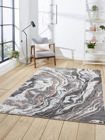 Apollo GR584 Modern Abstract Rug in Grey/Rose styled in a modern room