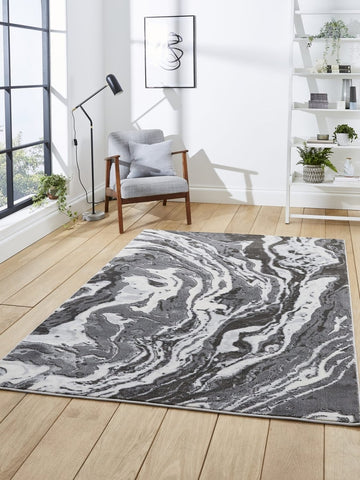Apollo GR584 Modern Abstract Rug in Grey styled in a modern room