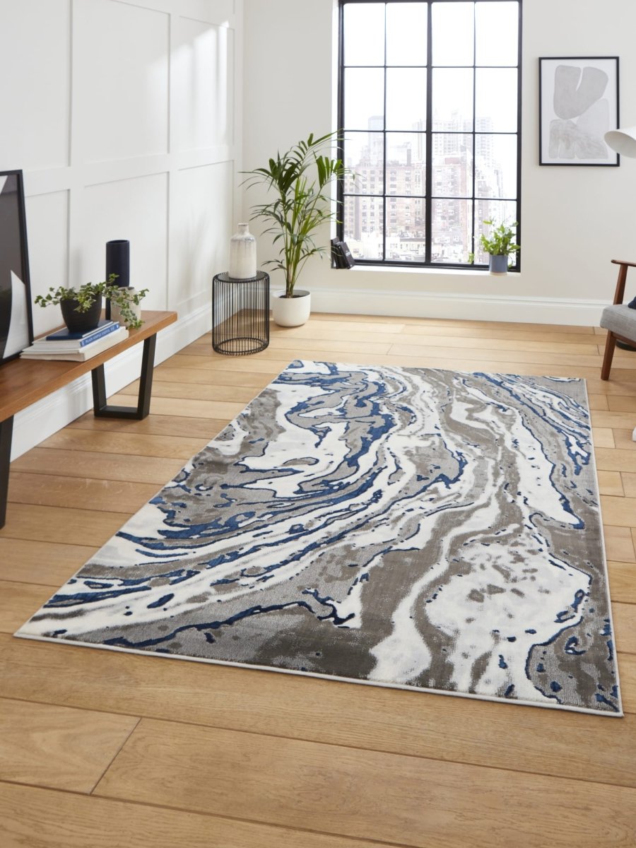 Apollo GR584 Modern Abstract Rug in Grey/Navy styled in a modern room