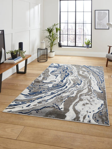 Apollo GR584 Modern Abstract Rug in Grey/Navy styled in a modern room