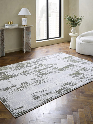Apollo HE052 Modern Abstract Rug in Grey/Green styled in a modern room