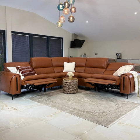 Upholstered in soft tan leather for a warm, premium look.