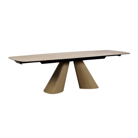 A modern rectangular dining table with a light oak wood top and a sculptural tripod base made of matching wood, shown on a plain white background.