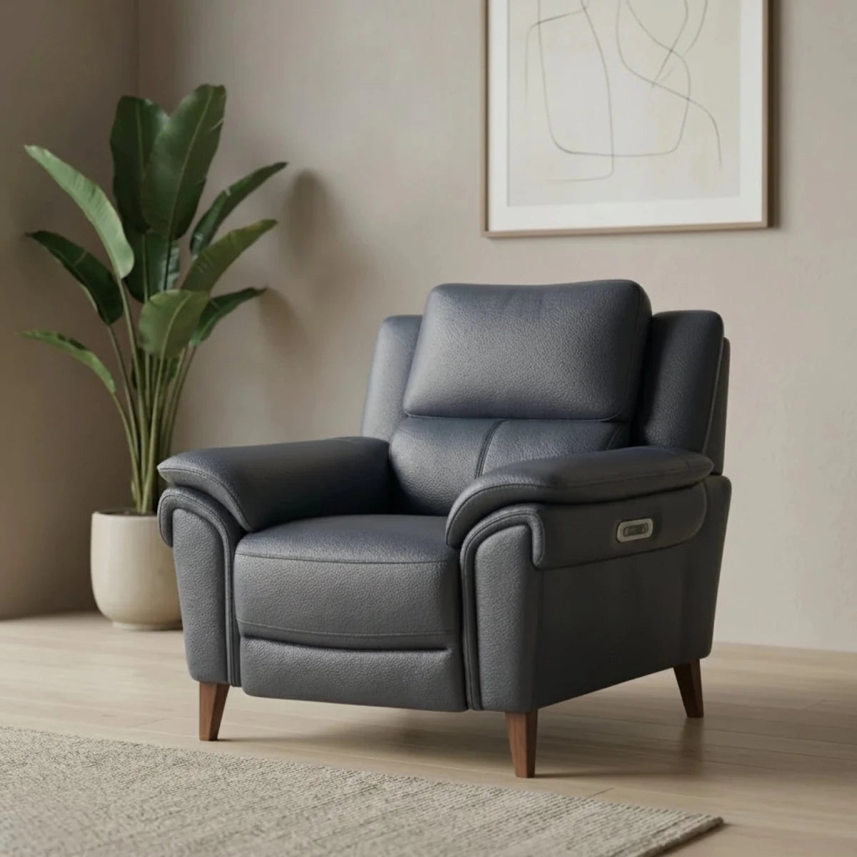 Modern recliner armchair with coil sprung foam seating and support.