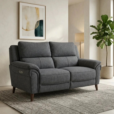 Modern three-seater recliner sofa with coil sprung foam seating.
