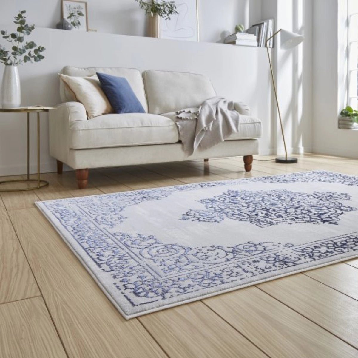 Artemis Blue Silver rug styled in a contemporary living room