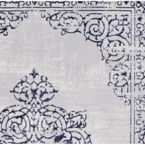 Modern blue and silver rug with shimmering finish