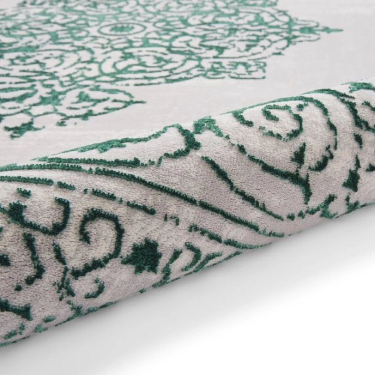 Close-up of a textured Artemis B9076A Green and Silver Rug with metallic finish