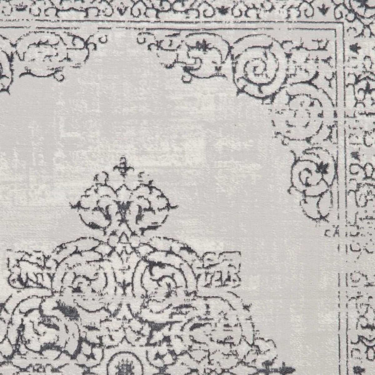 Artemis Silver rug styled in a modern living room
