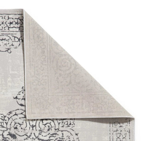 Artemis Silver rug styled in a modern living room - Fold