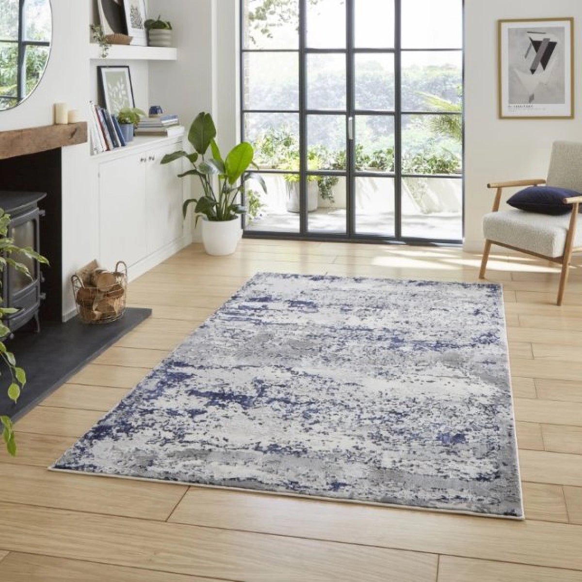 Artemis B9289A modern abstract blue rug with metallic detailing and a high-density pile. Durable, stylish and available in multiple sizes.
