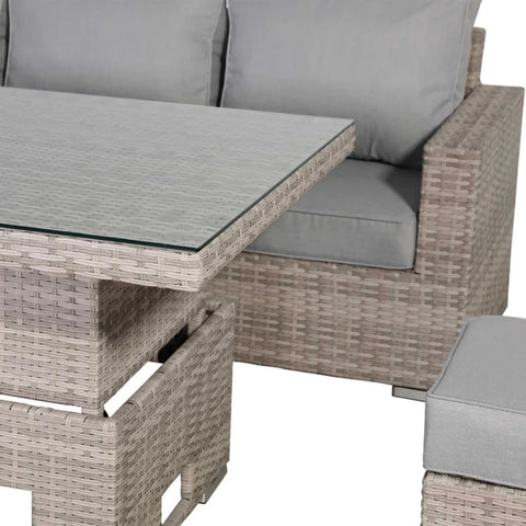 Adjustable rising table converting from coffee to dining height.