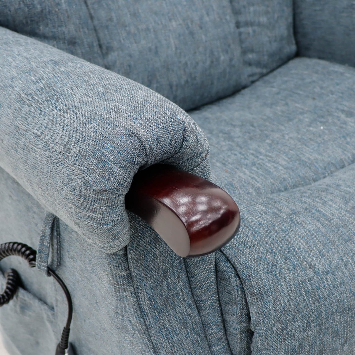 Blue Gray upholstered chair with a brown armrest cover