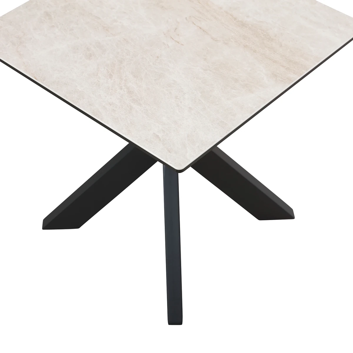 Square table with light-colored top and black metal legs on a white background