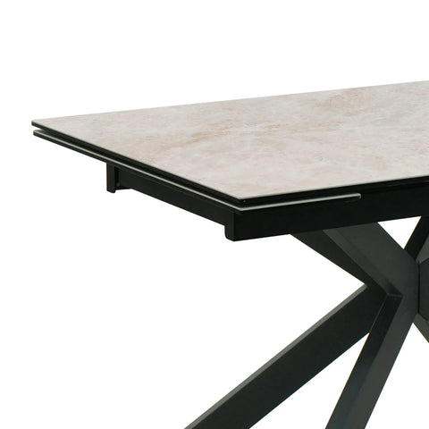 Athena sand ceramic extending dining table starburst base