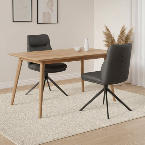 Atlanta charcoal PU swivel dining chairs with black metal legs. Comfortable, modern and available in sets of 4, 6 or 8.