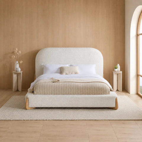 Soft fabric bed frame with rounded headboard and minimalist style.