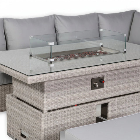 Adjustable firepit table for lounging and dining use.