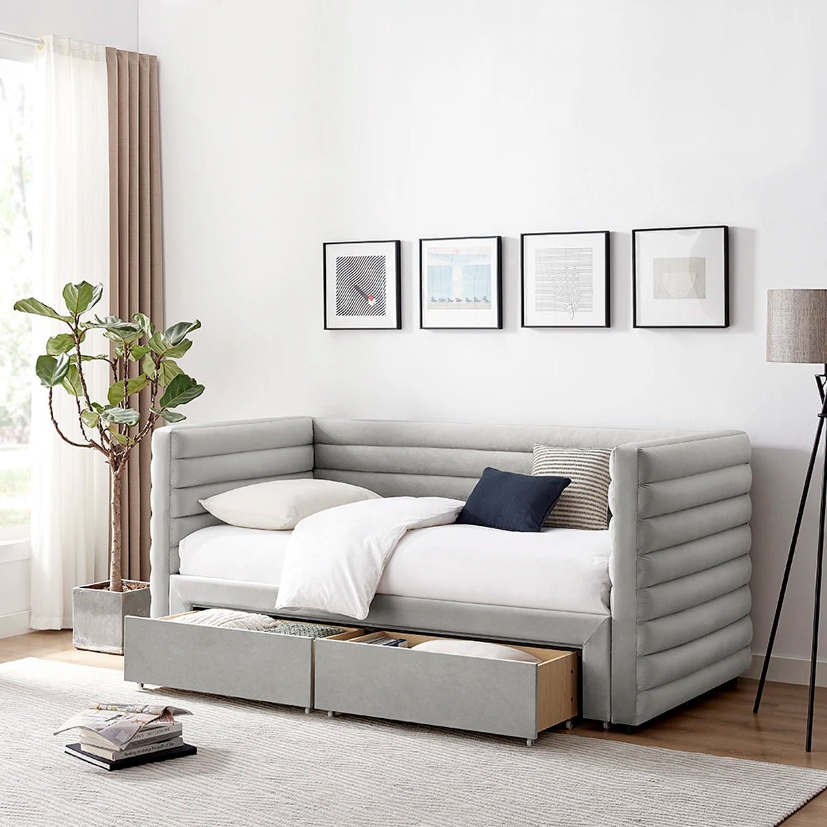 Bellanova Luxe Daybed. A light grey velvet upholstered daybed with padded channel tufting and under-bed storage drawers.