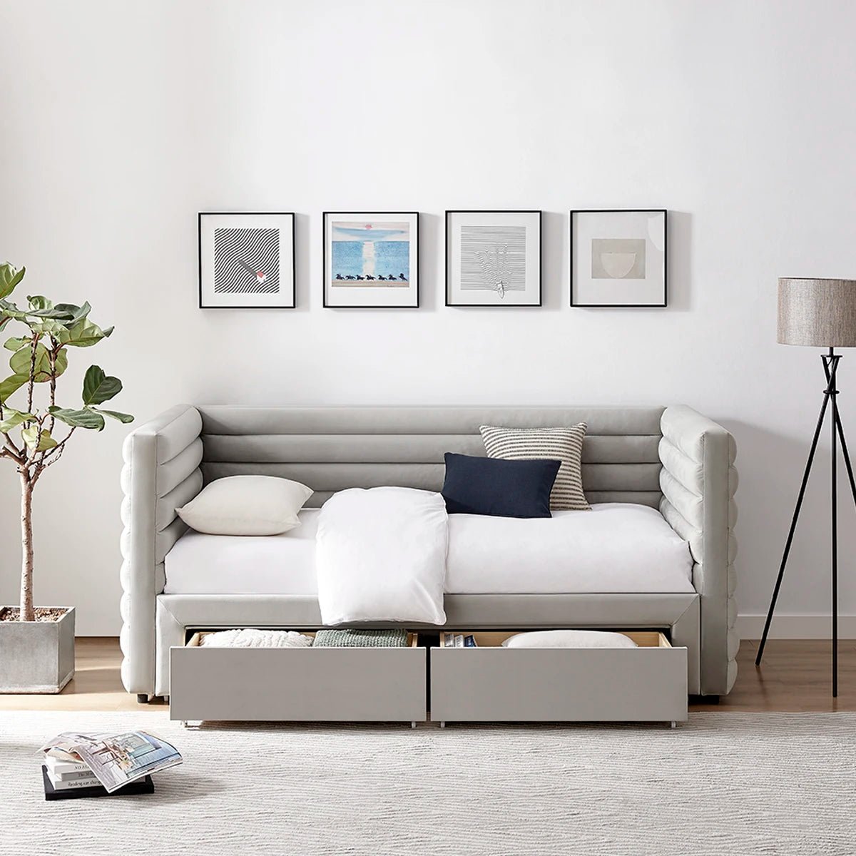 Lifestyle image of the Bellanova Luxe Daybed. A sleek fluted design with dual storage drawers in a choice of Grey or Taupe Velvet. 