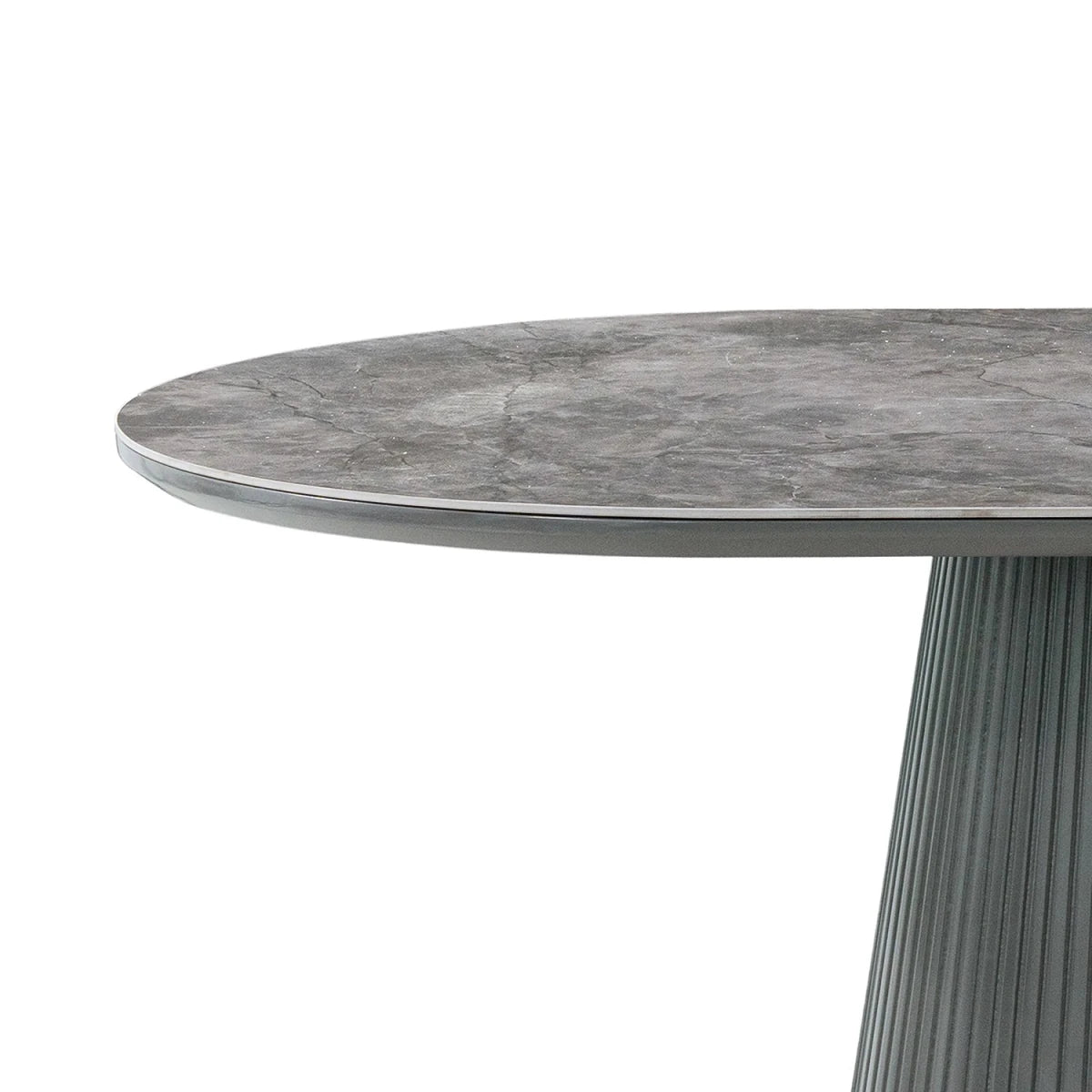 Close-up of a Bellagio Grey Sintered Stone Dining Table with Fluted Pedestal Base with a gray stone-look top and a fluted pedestal base, shown on a white background.