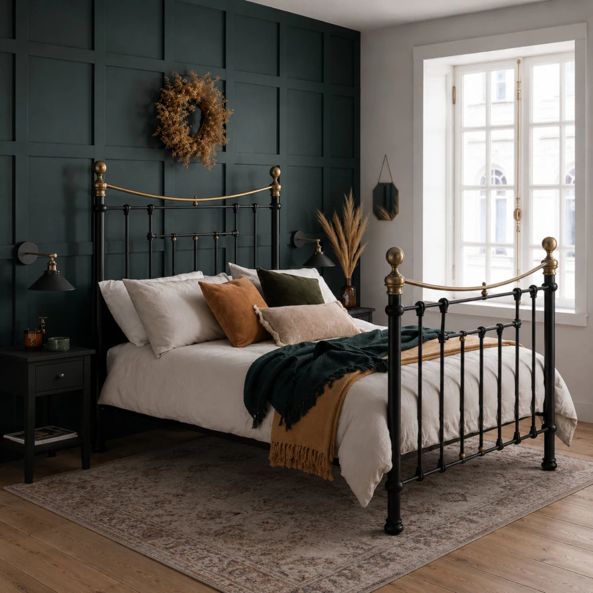 Victorian style metal bed with antique brass detailing.
