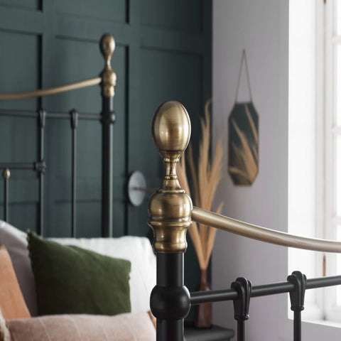 Strong steel bed frame with powder coated finish for durability.