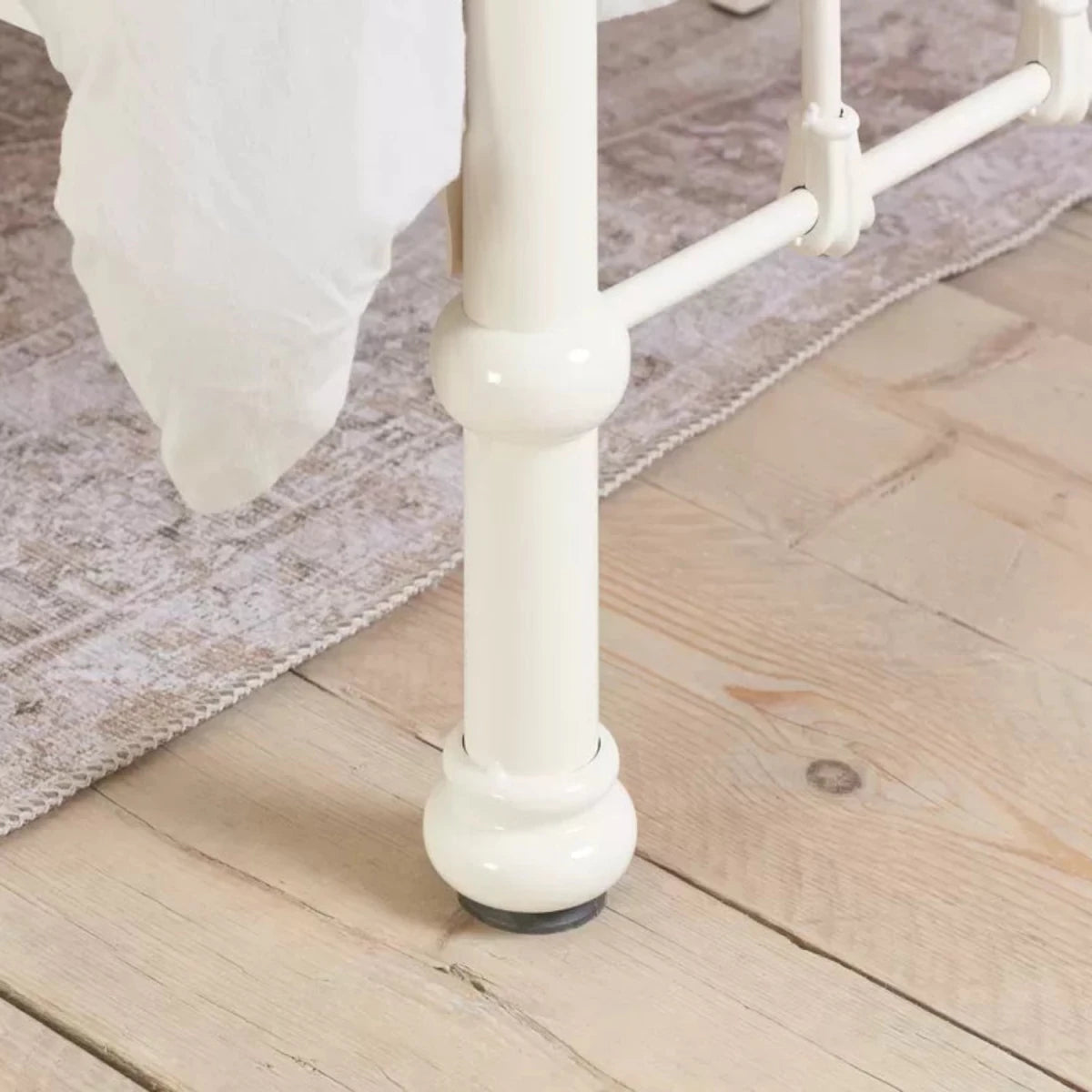 Metal bed feet with protective finish for strength and durability.