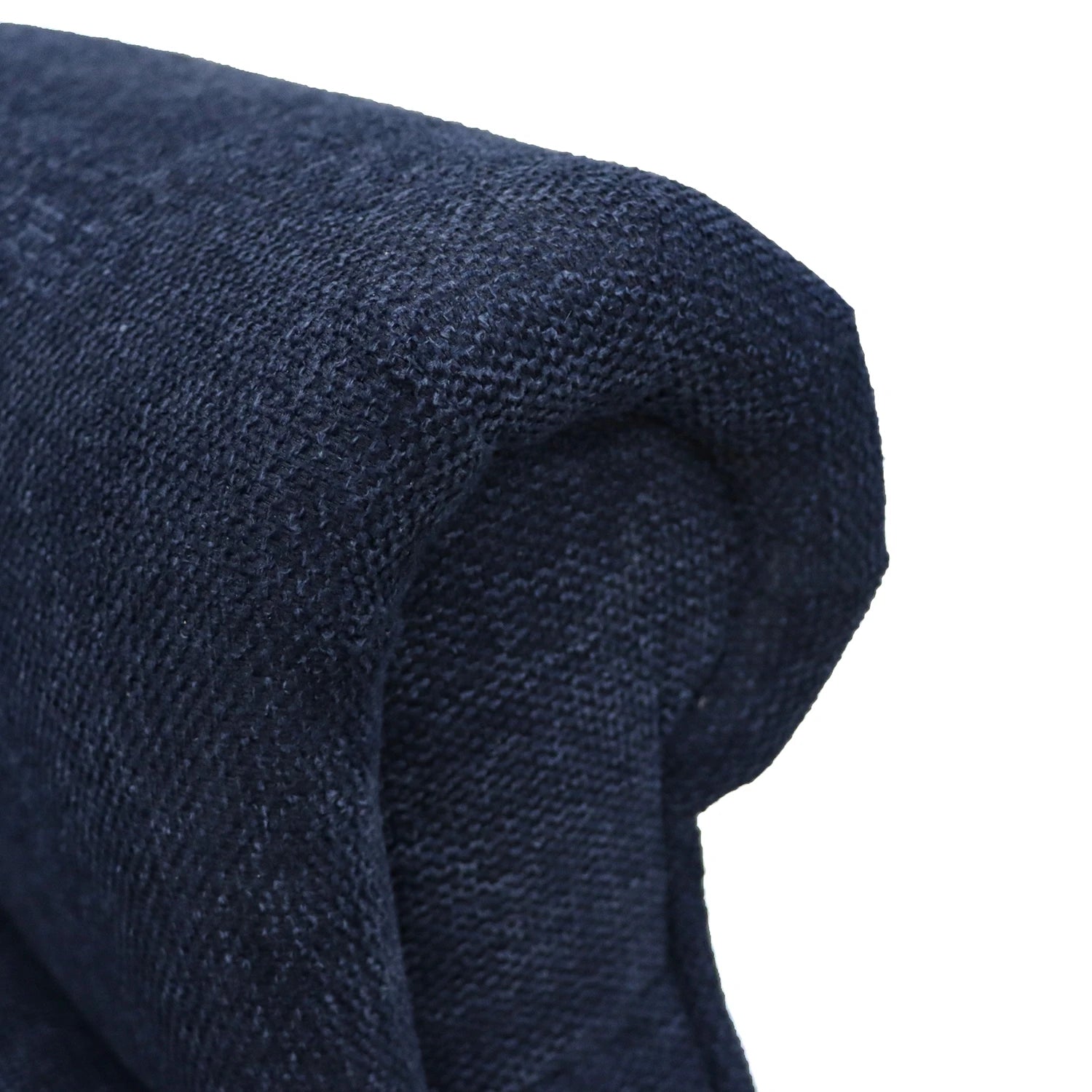 A close-up of a folded dark navy blue woven fabric arm of Berkshire Blue Fabric Upholstered Premium Comfort Accessibility Rise & Recline Chair with Quad Motor