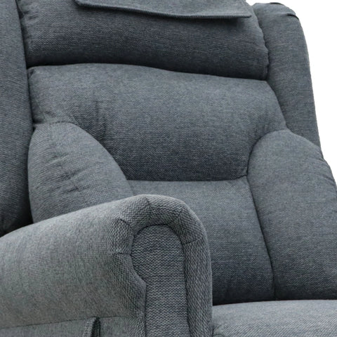 Close-up of a Berkshire Steel Grey Fabric Upholstered Premium Comfort Accessibility Rise & Recline Chair with Dual or Quad Motor showing the textured fabric, padded backrest, armrest, and headrest cushion.